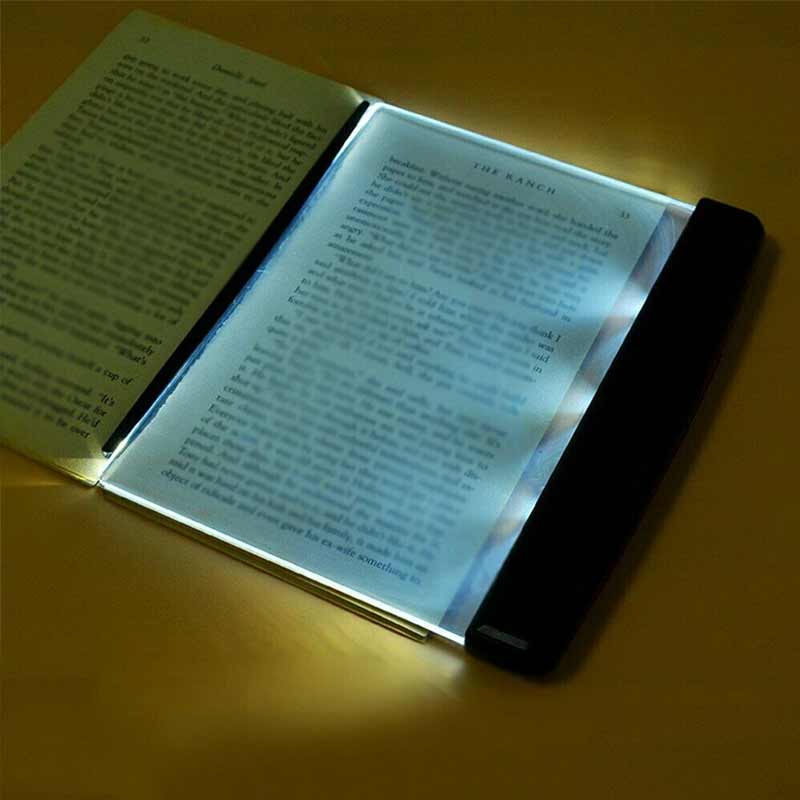 Photo lampe lecture pour lire le soir dans la pénombre